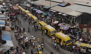 People shopping at a market in Lagos, Nigeria. Photograph: Sunday Alamba/AP 