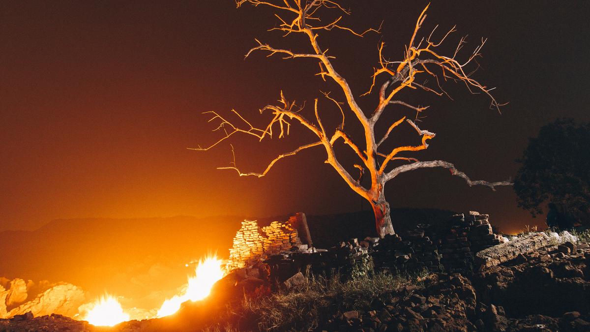 Flames rise from the ground in Jharia coalfield, where the land around the areas has burned for a century as a result of mining and venting gases.